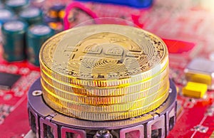 bitcoin concept - gold coin, computer circuit Board with bitcoin processor