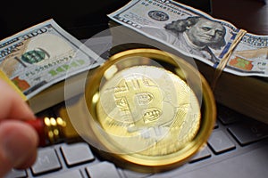 Bitcoin Crypto Currency Being Looked At Closely Through A Magnifying Glass As A Potential Speculative Investment photo