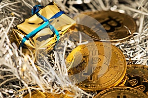 Bitcoin Cryptocurrency BTC Coins on the Christmas New Year Backgrounds.