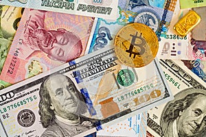 Bitcoin and dollar bills