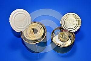 Bitcoin and dollars in tin can. Keeping money and cryptocurrency in metal food can. Ð¡rypto coin XRP Ripple, Ethereum is hidden in