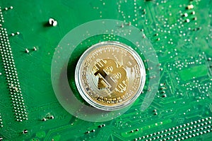 Bitcoin on electrical circuit background