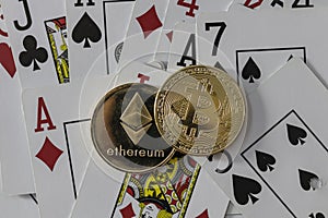 Bitcoin and etherium token with cards and dice