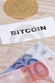 Bitcoin and euro bills. Cryptocurrency. International network payment. Finance concept