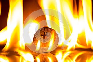 Bitcoin on fire flames background