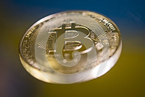Bitcoin gold coin close up macro shot