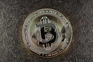 Bitcoin gold coin on metal surface. Symbol of Cryptocurrency. Bit coin digital currency. Online finance