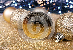 Bitcoin golden coin on a shiny Christmas background stock photo images