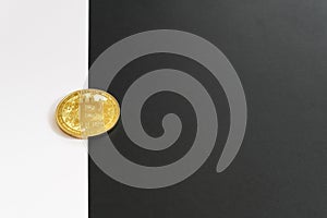 Bitcoin halving concept in cryptocurrency. Coin in black and white background.