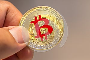 Bitcoin in hand,war of bitcoin,pull bitcoin with hand to hand, m