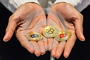 Bitcoin in hand,war of bitcoin,pull bitcoin with hand to hand, m
