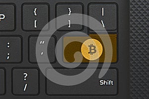 Bitcoin icon on keyboard key. Conceptual idea of cryptocurrency