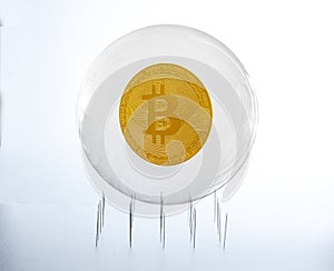 Bitcoin inside a bubble over a needles bed simulating fragility