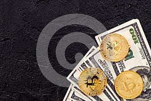 Bitcoin with international currency banknotes on black background top view space for text