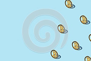 Bitcoin izometric pattern on bright light blue background.