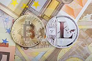 Bitcoin and laitcoin on money background