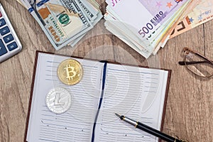 Bitcoin, litecoin, dollar euro, pen notepad calculator