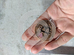 Bitcoin Litecoin Monero Physical Coins Cryptocurrency Front View in Palm Hand