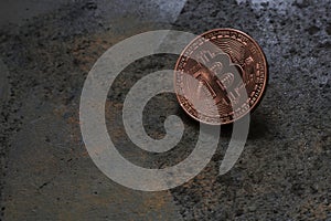 Bitcoin logo coinon rusty metal background