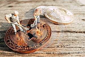 Bitcoin Mining miniature people digging