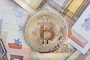 Bitcoin on money background