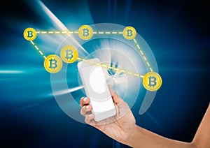 Bitcoin network icons and hand holding phone