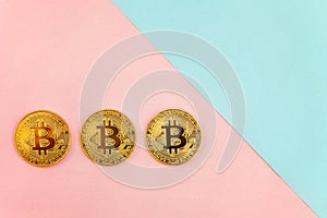 bitcoin on pink and blue background