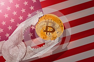 Bitcoin regulation in USA; bitcoin btc coin being squeezed in vice on United States flag background
