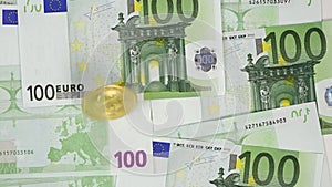 Bitcoin rotates like a yula on euro banknotes. investing in cryptocurrency.