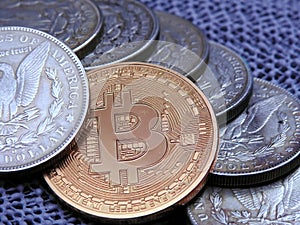 Bitcoin and a row Silver Morgan Dollars