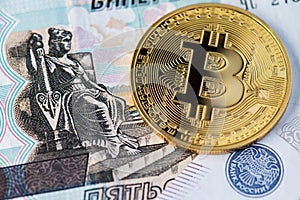 Bitcoin with Russian rubles. Bitcoins on Russian banknotes.