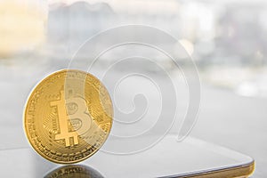 Bitcoin on Smartphone. Bitcoin in trading concept