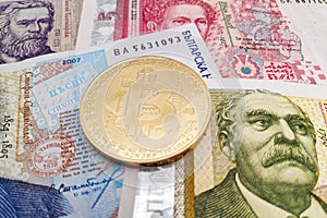 Bitcoin on a stack of Bulgarian Lev banknotes