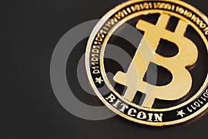 Bitcoin on the black background
