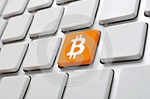 Bitcoin symbol on computer keyboard