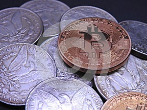 Bitcoin on top of Silver Morgan Dollars