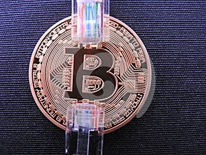 Bitcoin with on top two rj45 plugs