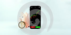 Bitcoin trading. Exchange bitcoin mobile phone app. Gold crypto currency BTC bitcoin, pink pig bank on white background