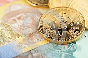 Bitcoin and Ukraine national currency. Bitcoins with Ukraine money hryvnya.