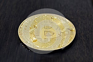 Bitcoin on wooden background