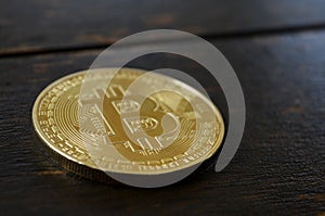 Bitcoin on wooden background