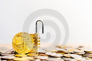 BitcoinBTC coin with padlock lying on coins stack.