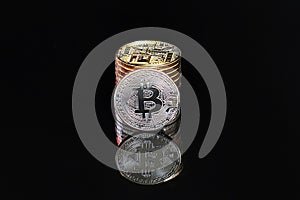 Bitcoins on a black background. Bitcoins and New Virtual money c