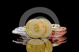 Bitcoins on a black background. Bitcoins and New Virtual money concept. Bitcoin is a new currency