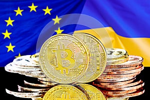Bitcoins on European Union and Ukraine flag background