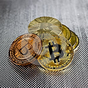Bitcoins - gold and brass