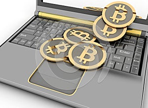 Bitcoins on laptop