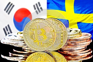 Bitcoins on South Korea and Sweden flag background