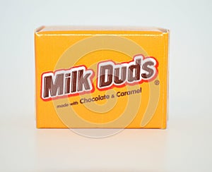 Bite size servings of chocolate Milk Duds in a yellow package