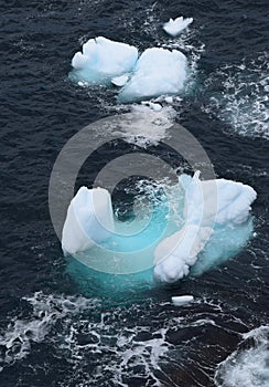 Bits of Iceberg floating floating in the water